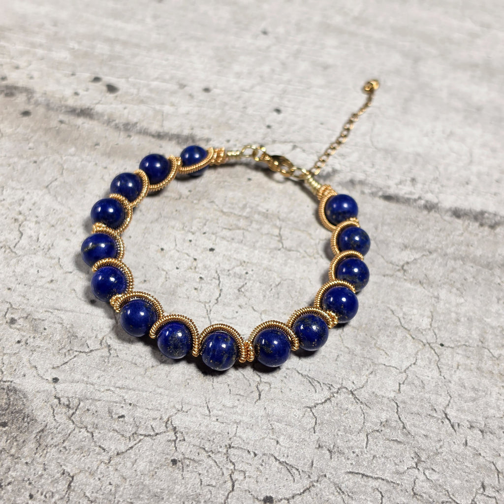 Bracelet lapis-lazuli et cuivre patiné doré wire wrapping fait main
